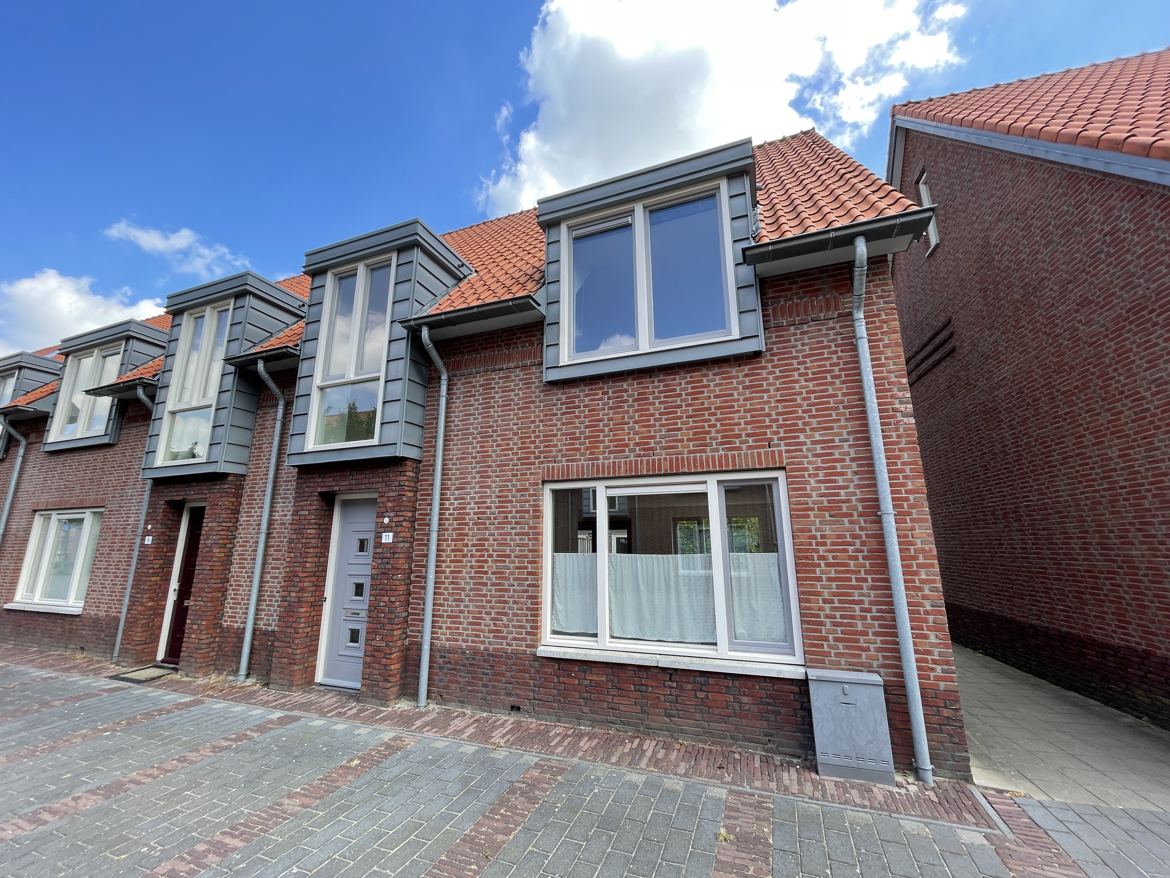 Terraced house for rent: Van Coeverdenstraat 16, Pathmos Enschede